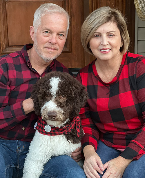 Owners Tim and Connie Funke with their dog